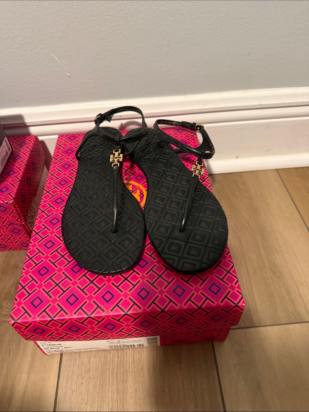 Tory Burch Black Quilted T-Strap Sandals with Gold Logo